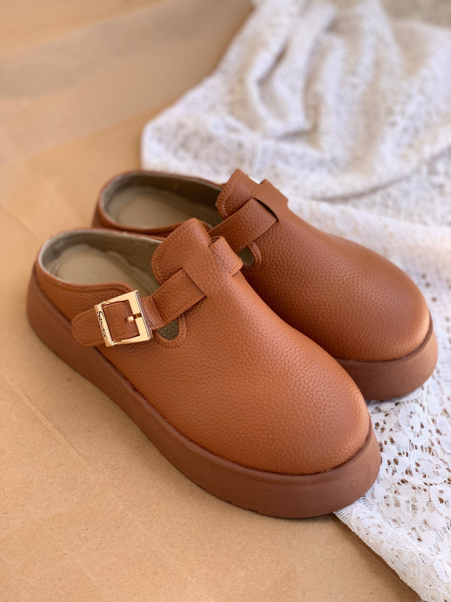 Leather clogs